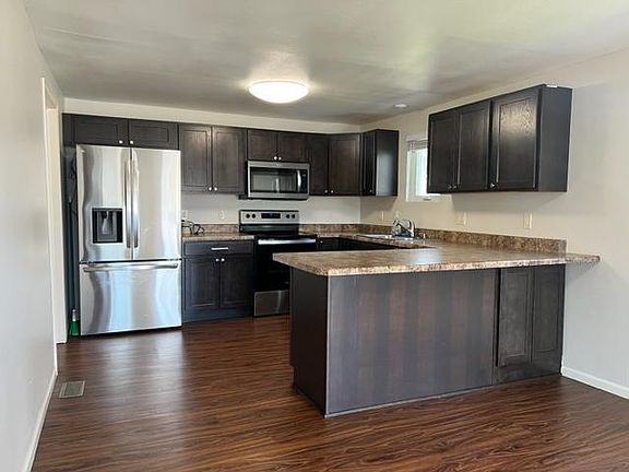 Updated kitchen with brand new stainless steel appliances