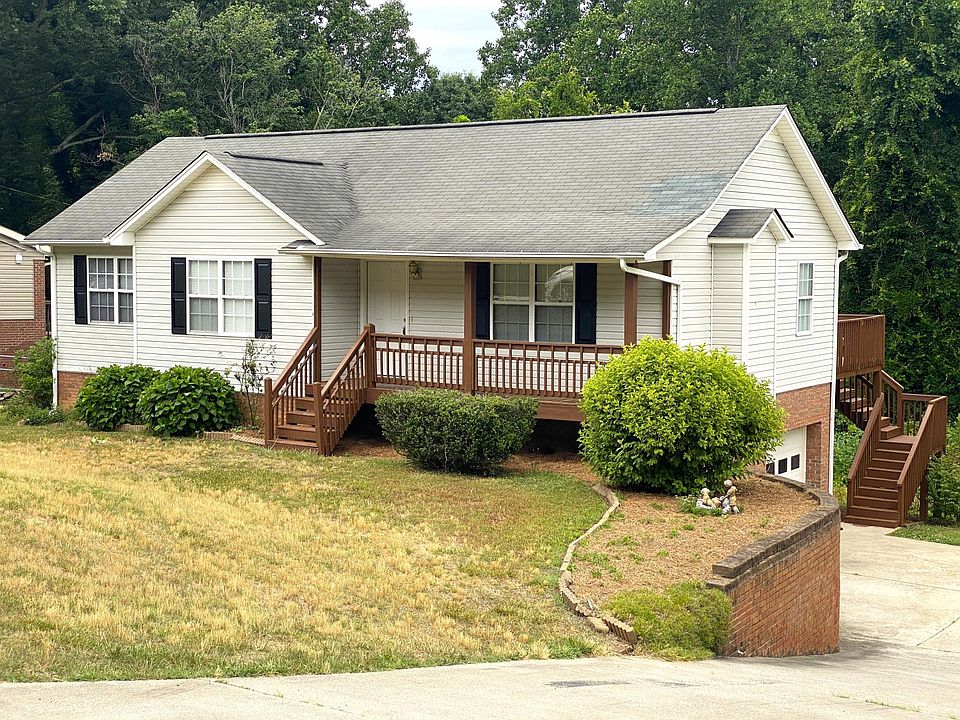 Front View. Notice back deck and lower level garage.