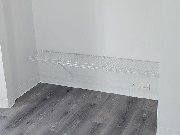 Closet for downstairs bedroom.