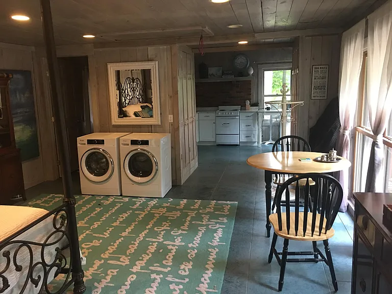View of the interior of the cabin with laundry machines.