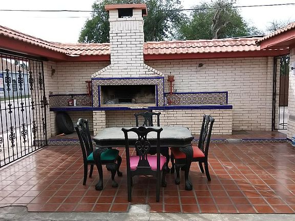 Beautiful patio with a chimney for great BBQs