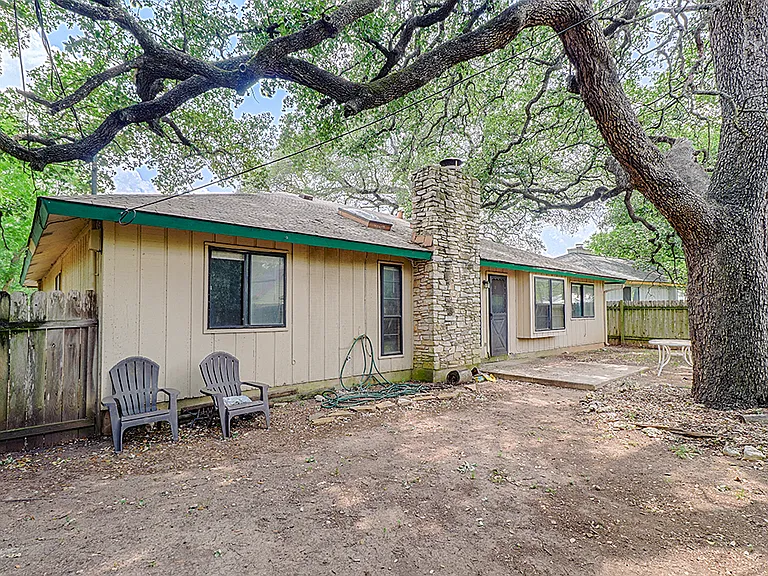 Backyard large enough for dogs. 200 year old plus oak has plenty of shade.