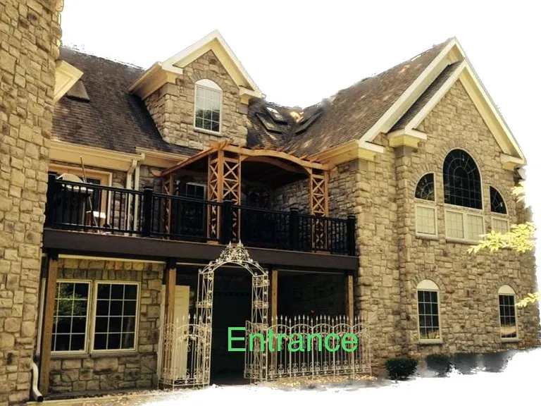 A shared house/one house with two living space with separate entrance.