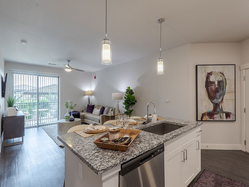 Spacious Kitchen With Granite Countertop