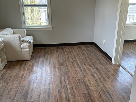 Living room with split unit installed in 2022. Works very efficiently