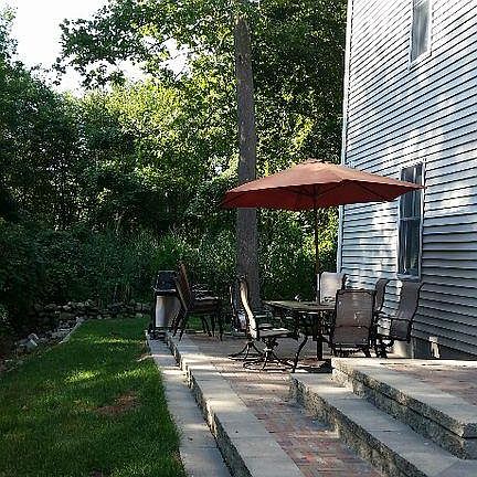 Ouside patio area with two dinning tables