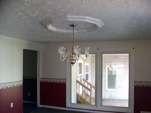 Large Dining Room, large windows, also sliding doors to patio