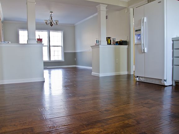 New Hardwood Floors in Kitchen Replaced Vinyl