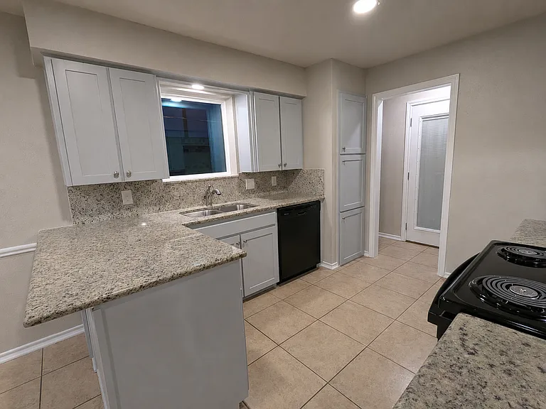 KITCHEN: Notice the Pantry to the right of the dishwasher, The Laundry is to the right of the pantry