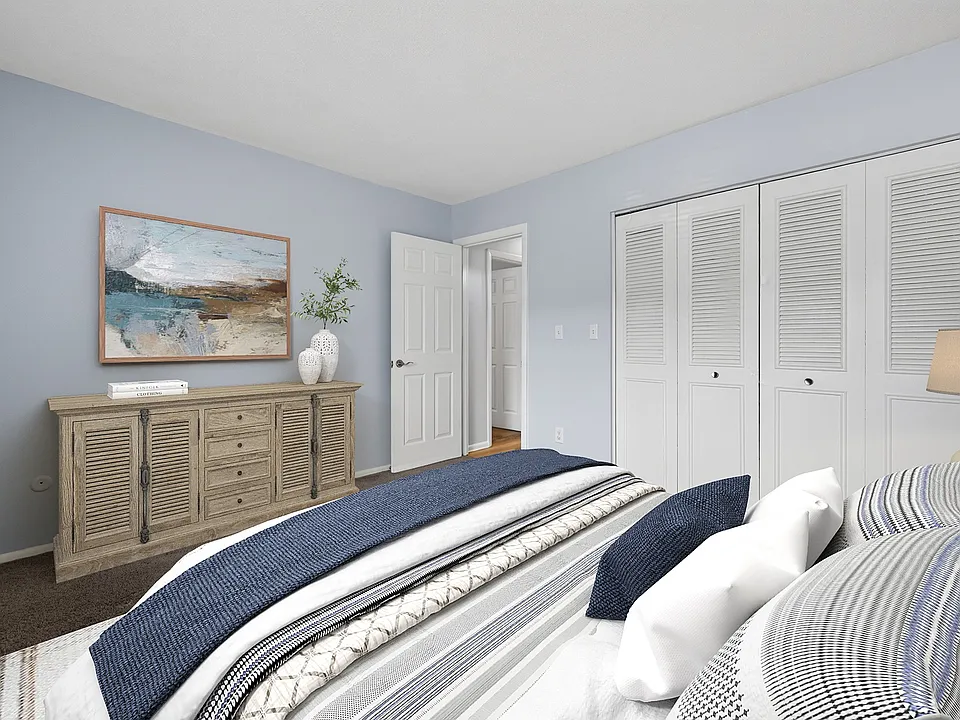 Explore the serene interiors of Park Village West. This well-appointed bedroom features soft hues, ample storage, and a tranquil atmosphere that invites relaxation. Elevate your living experiencecome see for yourself today!