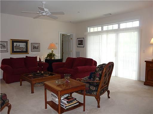 Living Room w Slider to Balcony