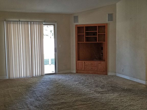 Living room w/ built in TV nook