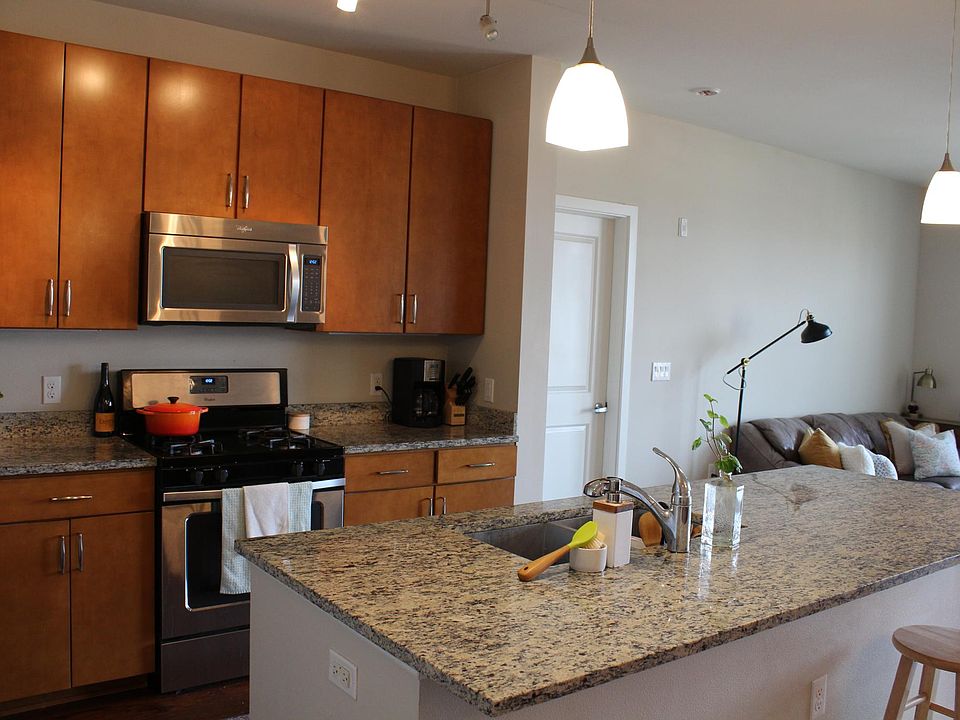 Kitchen with all stainless steel appliances and gas range