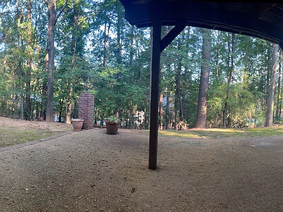 Patio entrance and outside view of private backyard