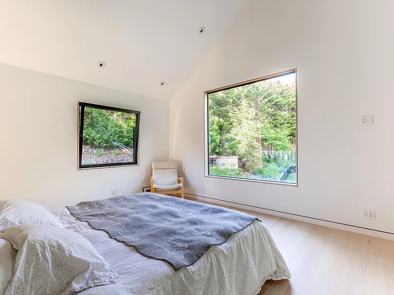 Primary bedroom looking out to garden
