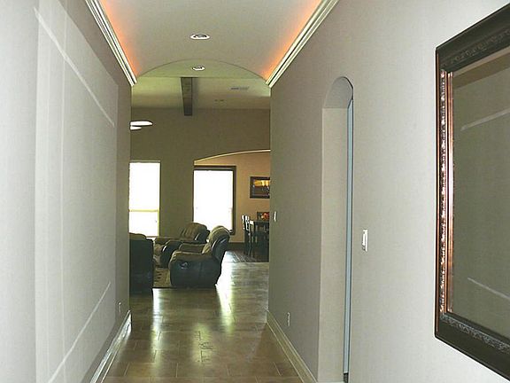 Grand entry with rounded ceilings and hidden rope lighting!