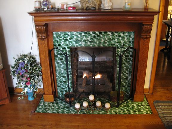 Beautiful green brick fireplace