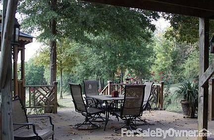 Patio has amazing sunset view overlooking miles of beautiful countryside.