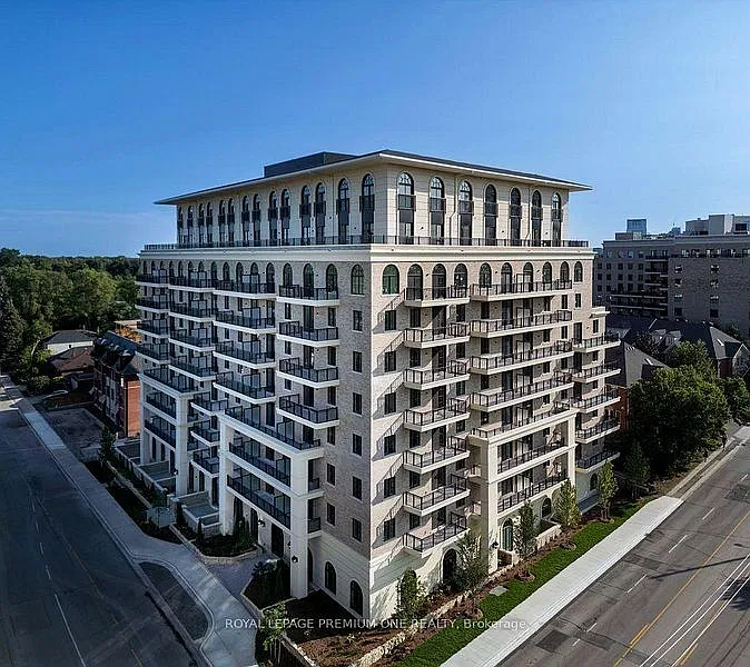 38 Earlington (Kinqsway Village Square) — Photo 1
