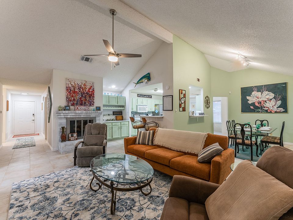 Comfortable living room with 55 inch smart tv and ample seating.