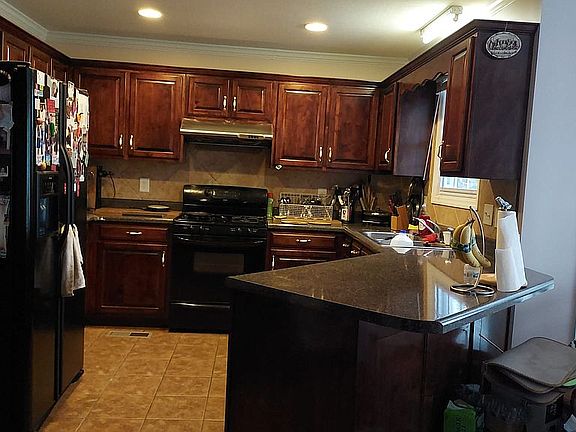 Kitchen with outside vented hood
