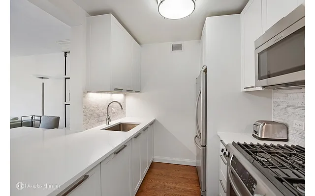 Sold by Douglas Elliman | media 11