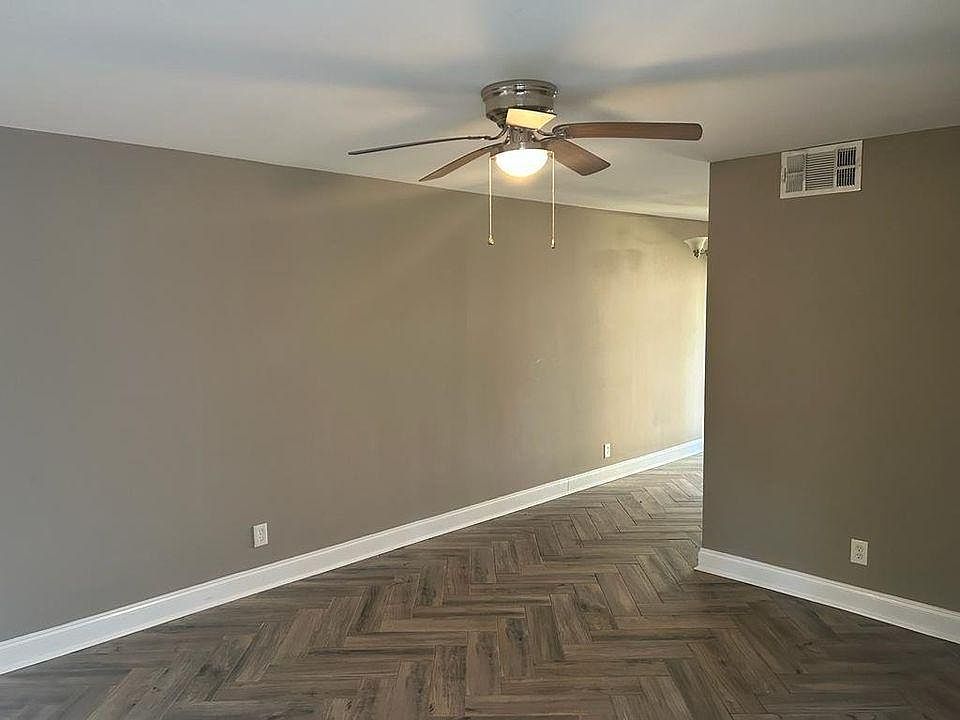 Living Room, but the walls are now white for more light.