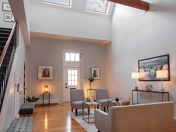 Gleaming hardwoods with soaring ceiling.