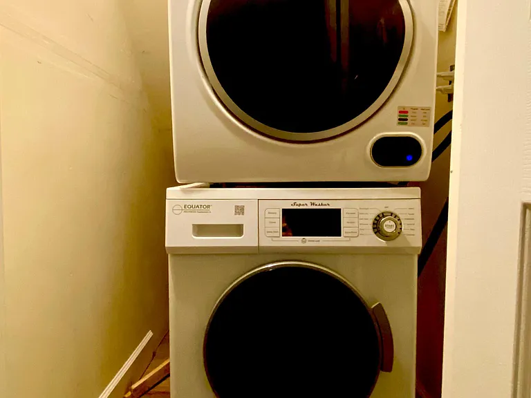 Stacking washer and dryer in unit