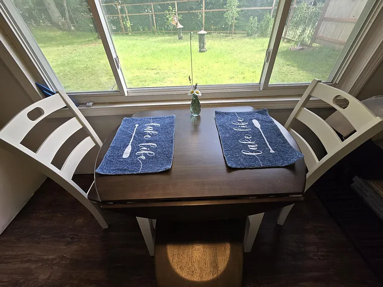 Seating for 4 at the table.