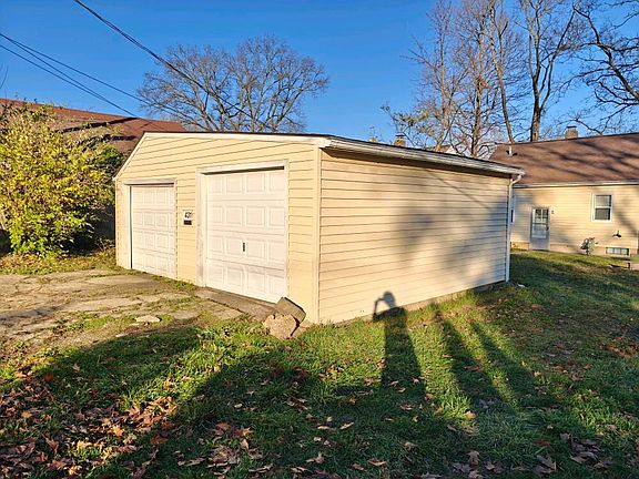 Two Car Garage with openers acessed from rear alley