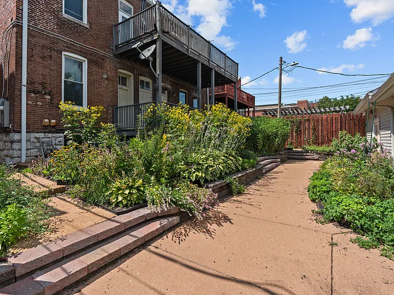 Rear Courtyard w/ community garden
