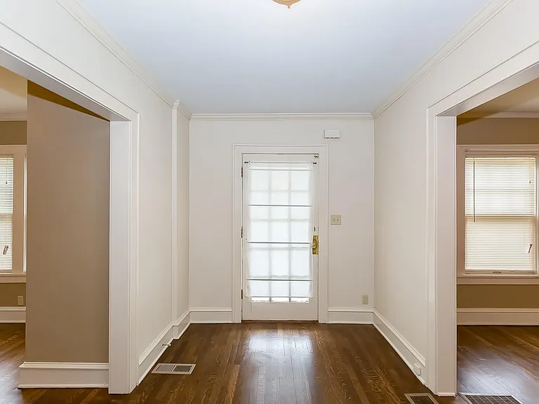 Entryway/ Front door...The Hardwood Floors have been refinished throughout the house.