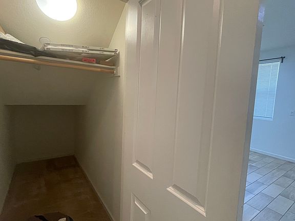 storage closet under the stairs