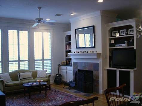 open living area, slate surround fireplace