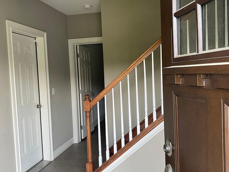 First floor entry. The garage is located to the left. Straight back the hallway leads to the family room and a full bathroom.