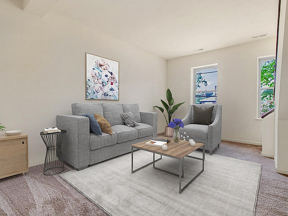 Open living room with lots of natural light.