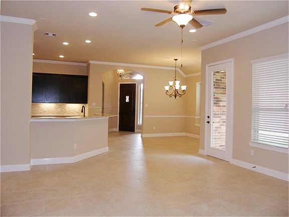 Vies of living room towards front door.
