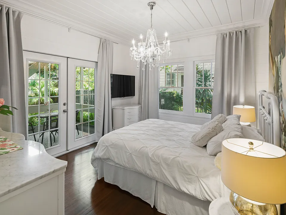 Restored wood floor meets with marble finishes