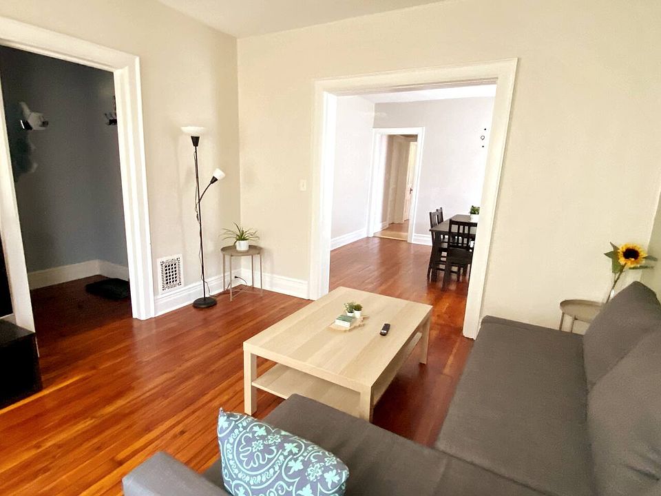 Spacious living room with a pull out sofa and 55 inch tv