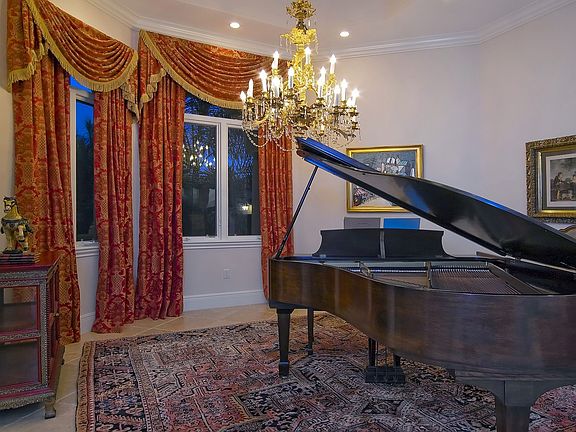 The music salon is open to the great room.