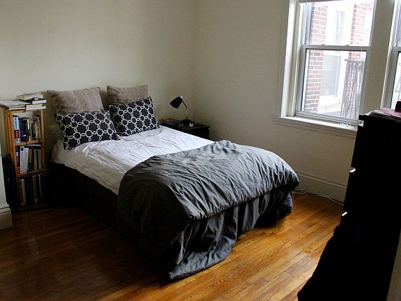 Bedroom, windows overlook center court