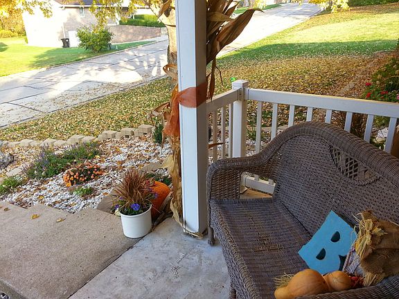 Front porch with fall leaves