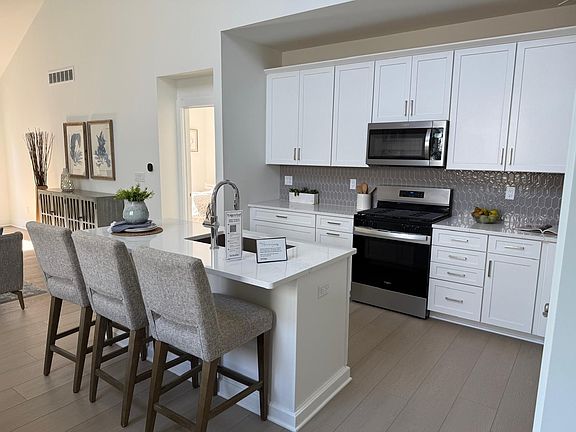 Open Kitchen with quartz counter top and high end appliances