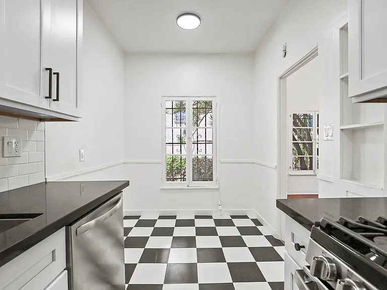Kitchen with Energy-Efficient Appliances and and Open-Concept Dining Area