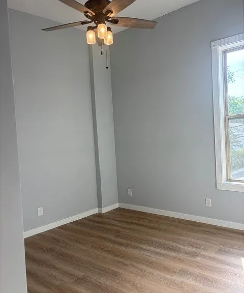 Bedroom #2 has ceiling fan, large East facing window overlooking Berlin's only downtown traffic light.