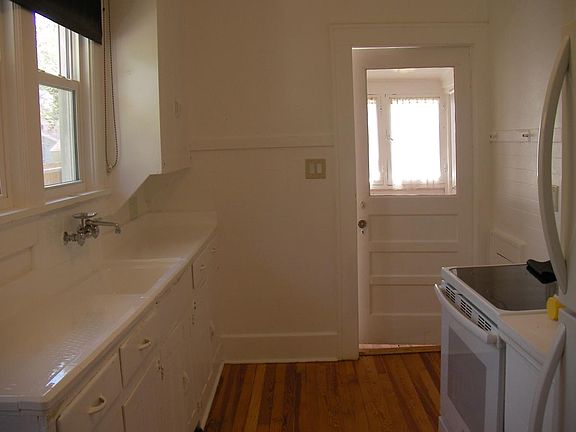 Kitchen facing back porch.