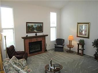 Living Room Has Fireplace with Gas Logs