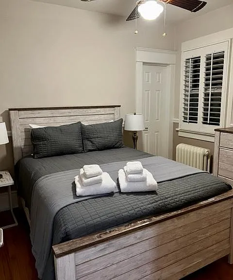 Bedroom 1 on main level with queen bed.