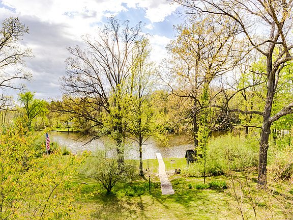 River view from the house - nice walkway directly to the dock - there's also a shed for storage convenience down near the water